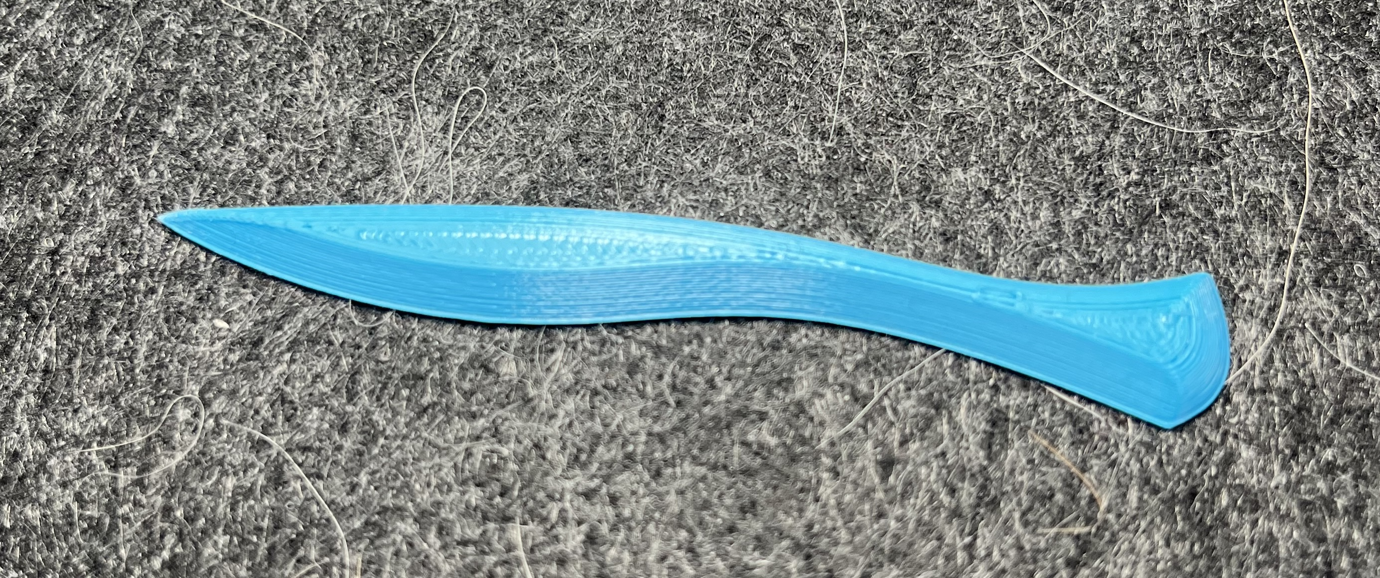 small corner turner printed in blue plastic